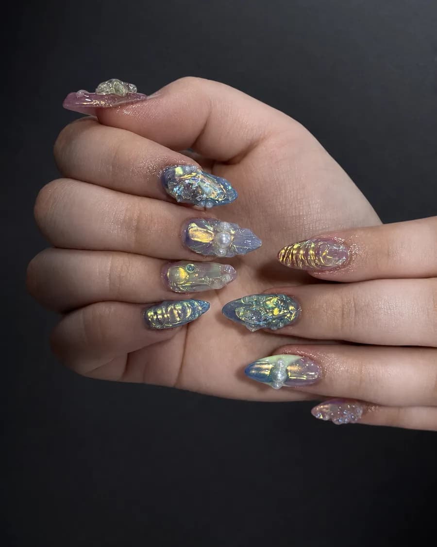 Iridescent aurora chrome almond nails with 3D gel detail at G Salon & Spa in Port St. Lucie, FL