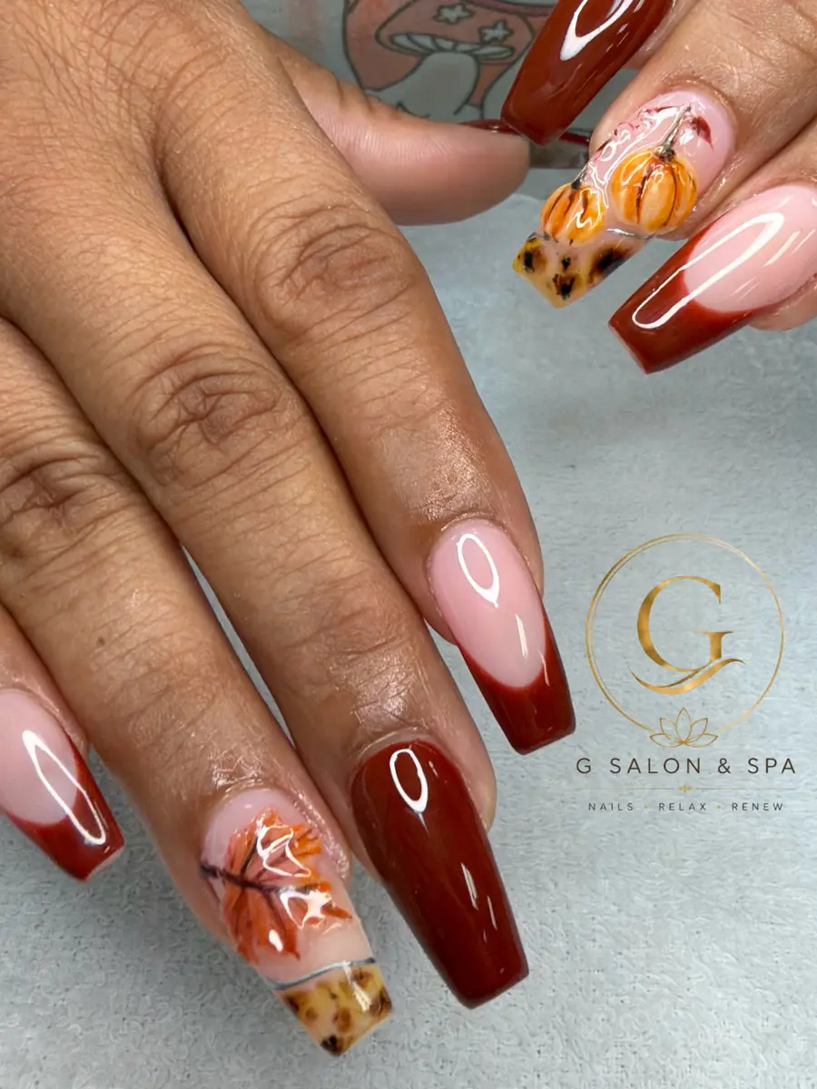 Burgundy coffin nails with plaid, pumpkin and burgundy French art at G Salon & Spa in Port St. Lucie, FL