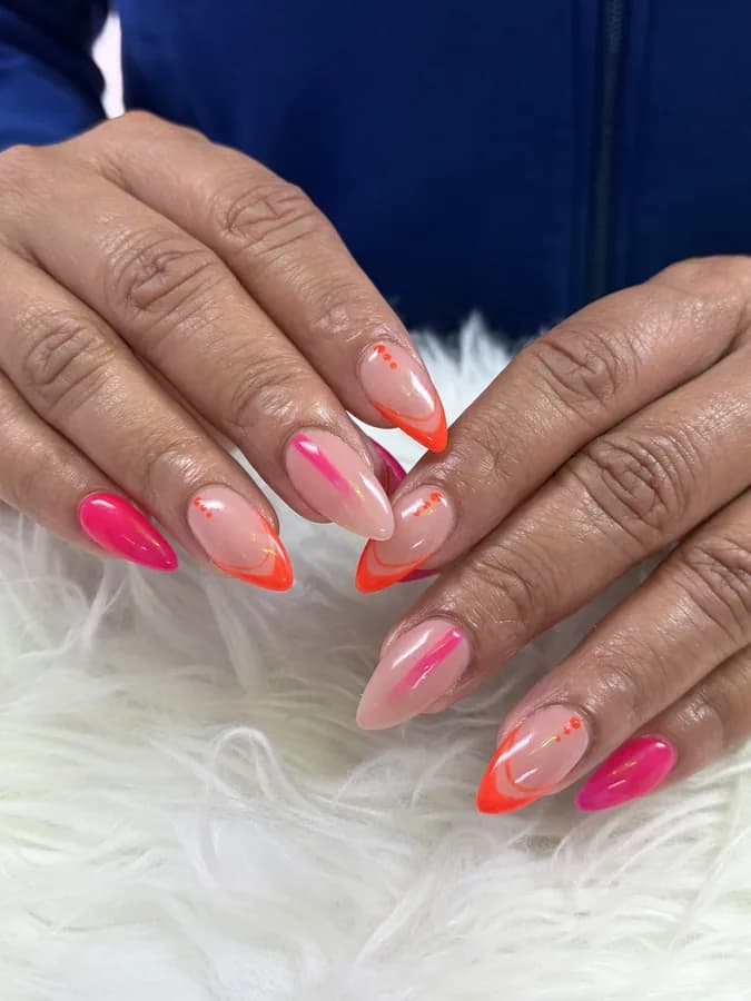 Long almond nails in hot pink, coral and neon orange